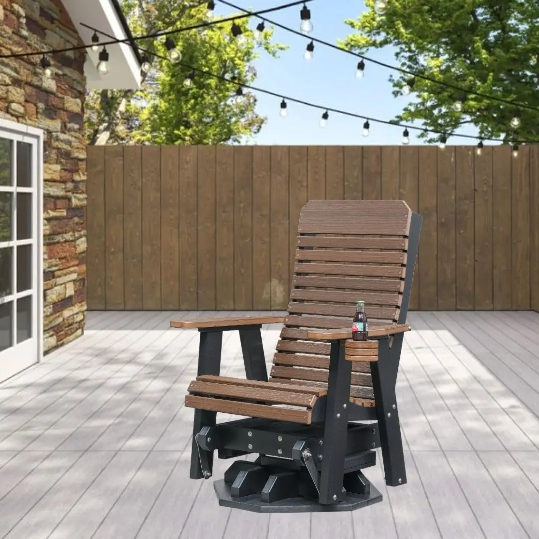 Adirondack-style wooden chair with cup holder on a deck, bottle placed on the arm, string lights overhead in a fenced backyard.